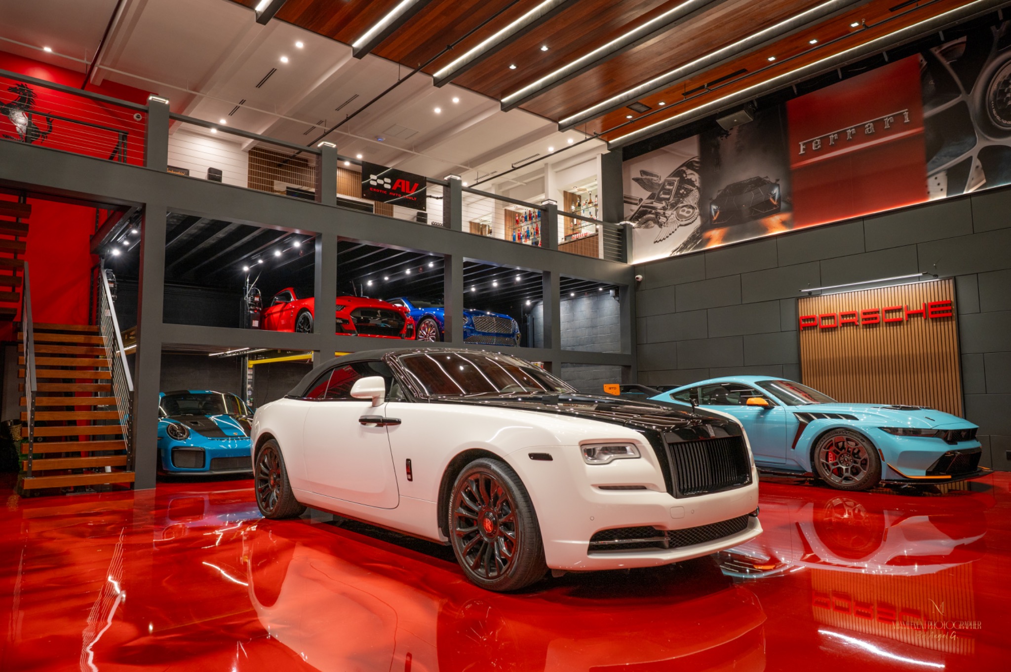 Luxury automobiles photographed inside a Miami showroom