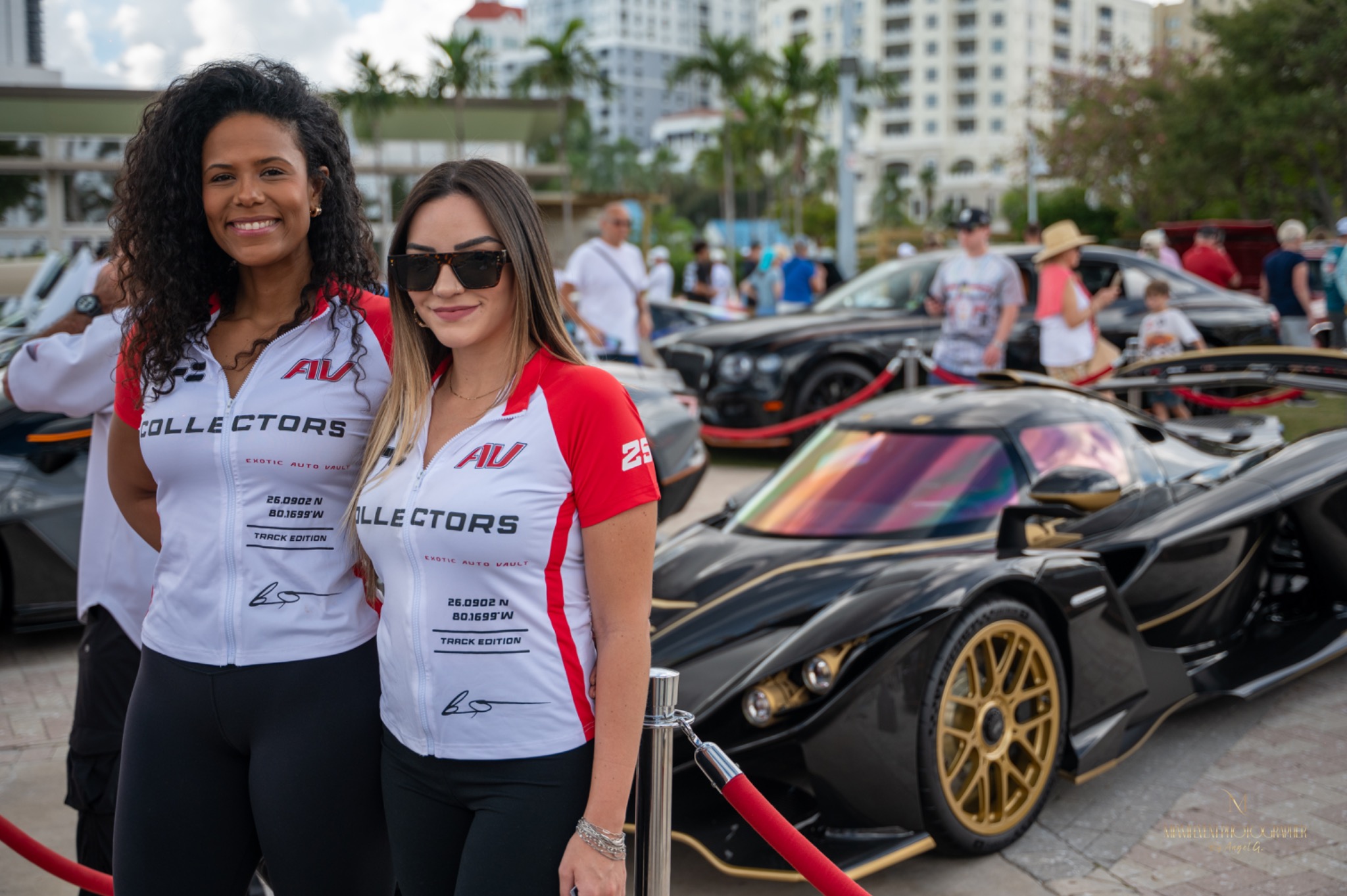 Brand representatives at an outdoor automotive event
