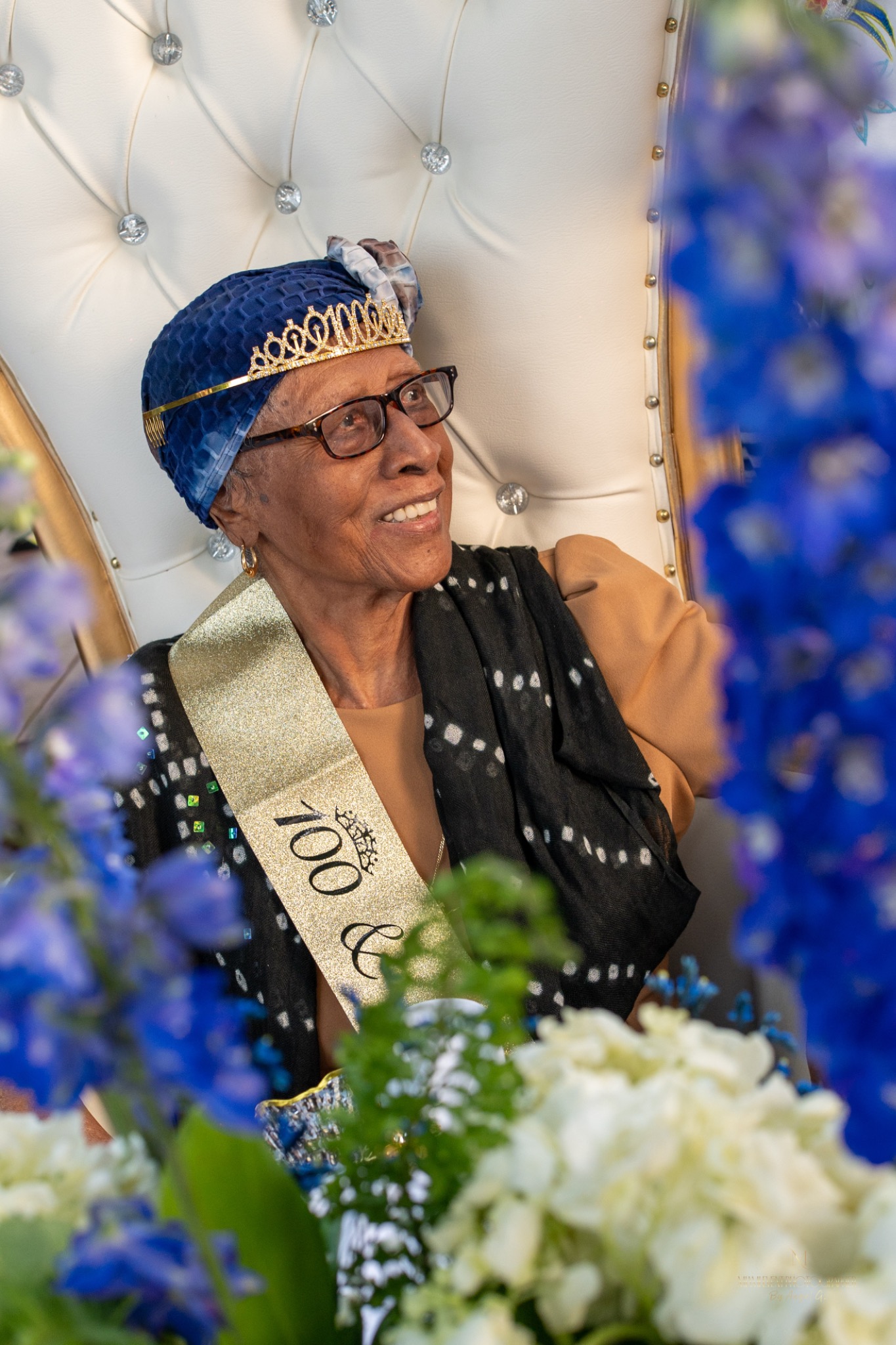 Honoree smiling during a milestone birthday celebration