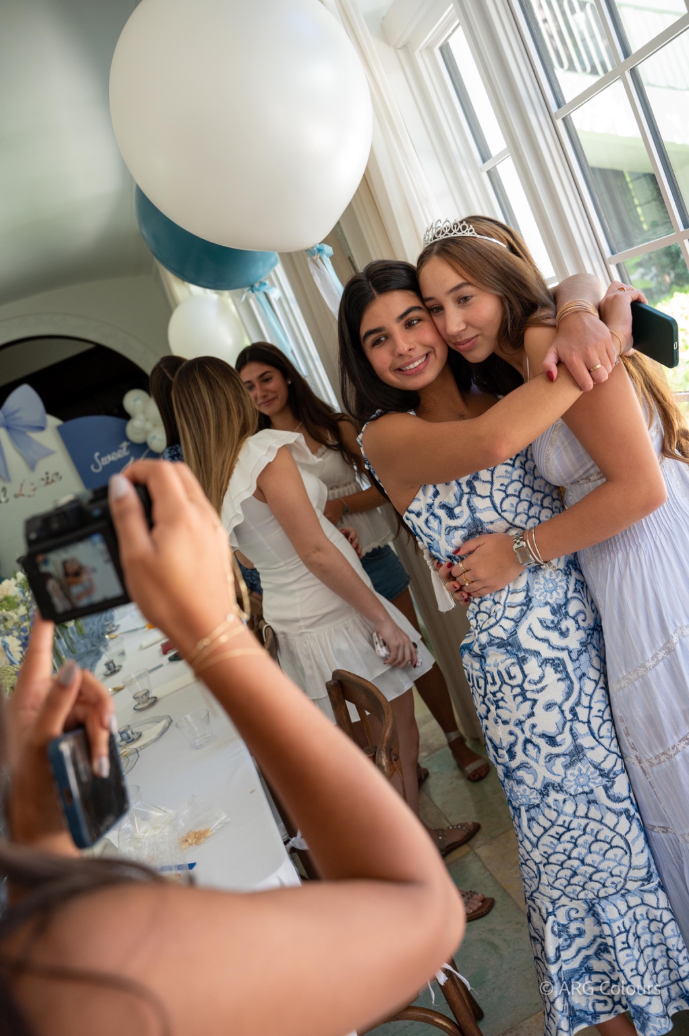 Friends embracing during a celebration